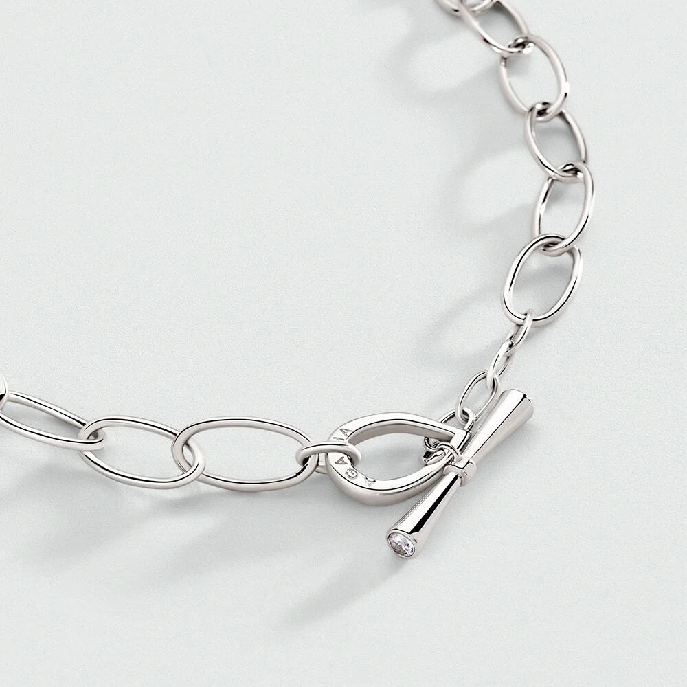 Collier CHAIN Agatha Paris en laiton rhodié – Ras du cou à maillons ovales et fermoir T
