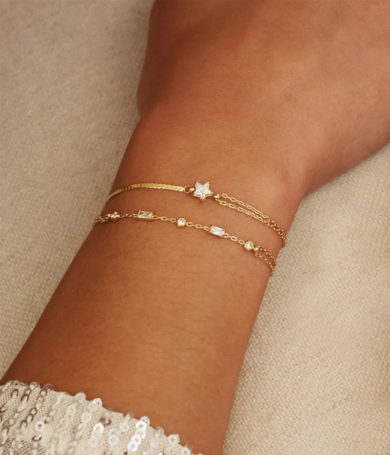 Bracelet Athis Zag Bijoux – Multi-rangs acier doré serti de zirconiums
