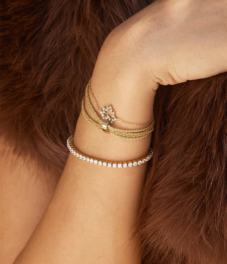 Bracelet Nero Zag Bijoux – Multi-rangs acier doré maille marguerite
