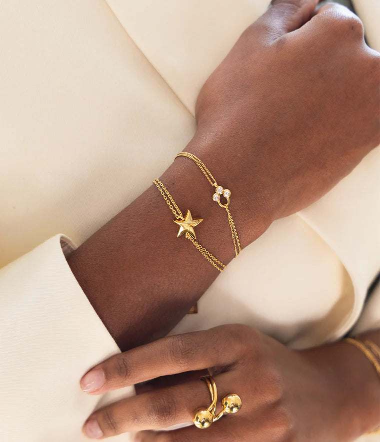 Bracelet Rossi Zag Bijoux en acier doré – Pendentif arc de cercle serti de zirconiums colorés