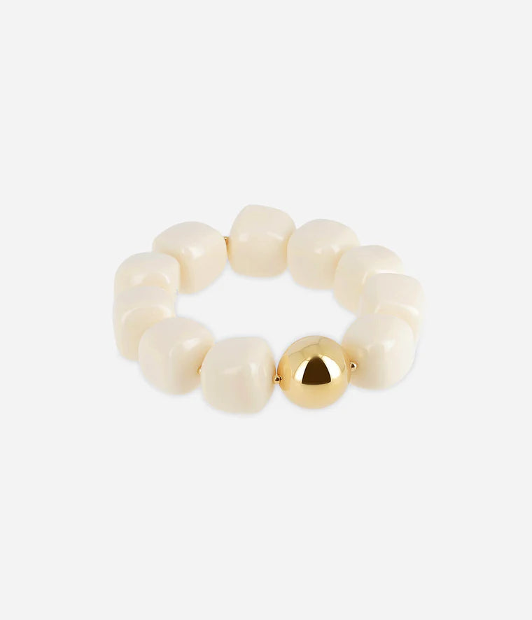 Bracelet Laïos Zag Bijoux en acier doré à l’or fin, orné de perles de résine colorées blanc