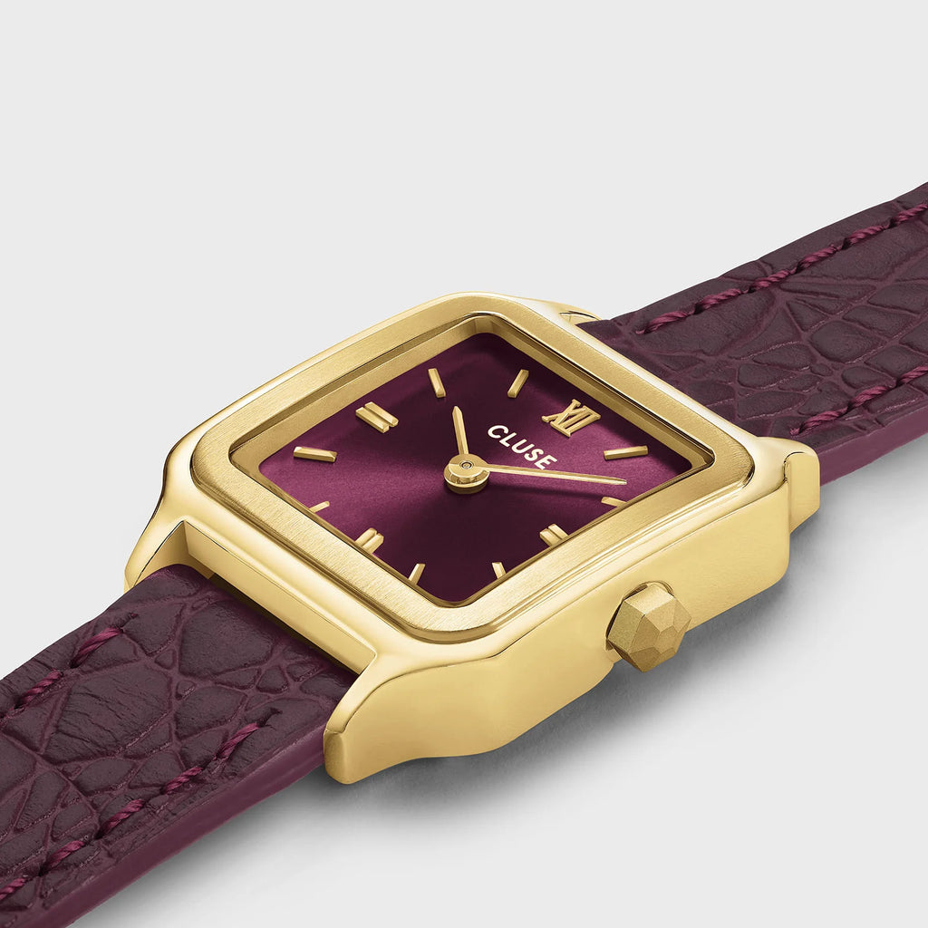 Montre Cluse Gracieuse Petite femme. Boîtier doré 24 mm, cadran rouge vin et double bracelet cuir aspect crocodile 14 mm. 