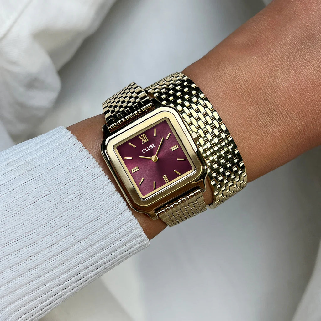 Montre Cluse Gracieuse Femme – Boîtier doré 28 mm, cadran rouge vin & double bracelet acier
