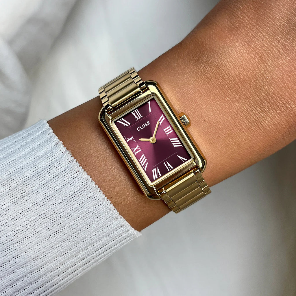 Montre Cluse Belisenna femme. Boîtier rectangulaire doré 21 mm, cadran rouge vin et bracelet acier couleur or