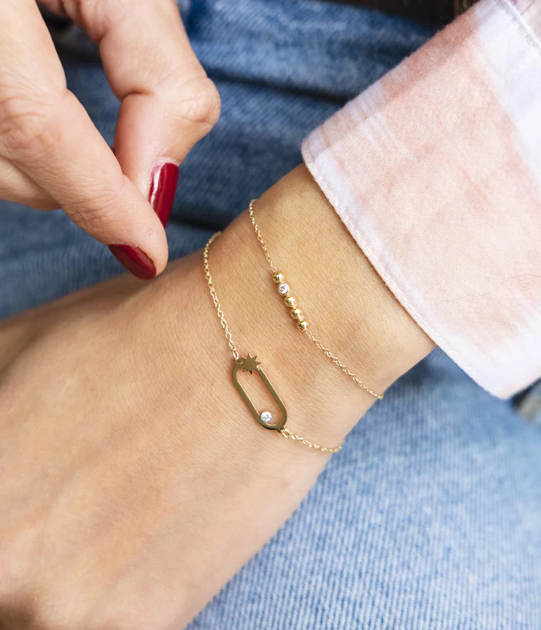 Bracelet Zag Bijoux Atoll – Acier doré à l’or fin & cristal en serti clos
